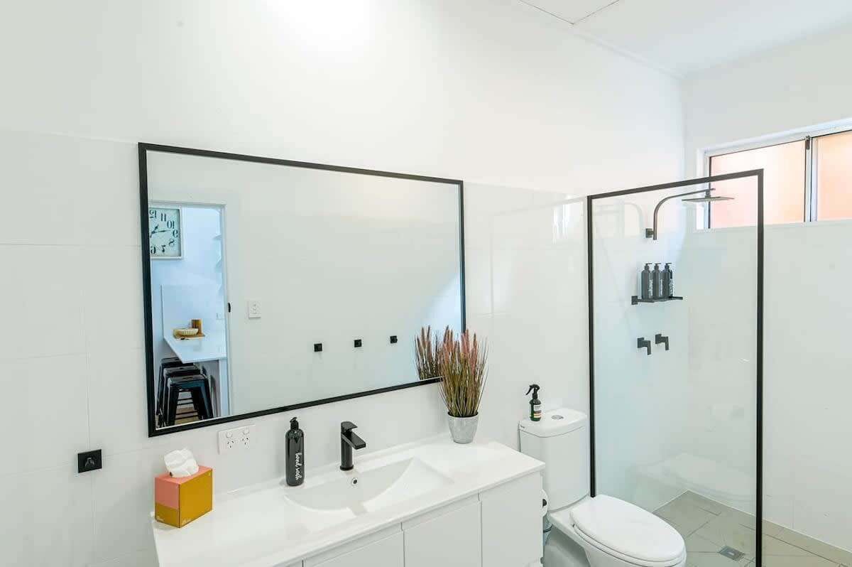 Shower, hair dryer, towels, shampoo
