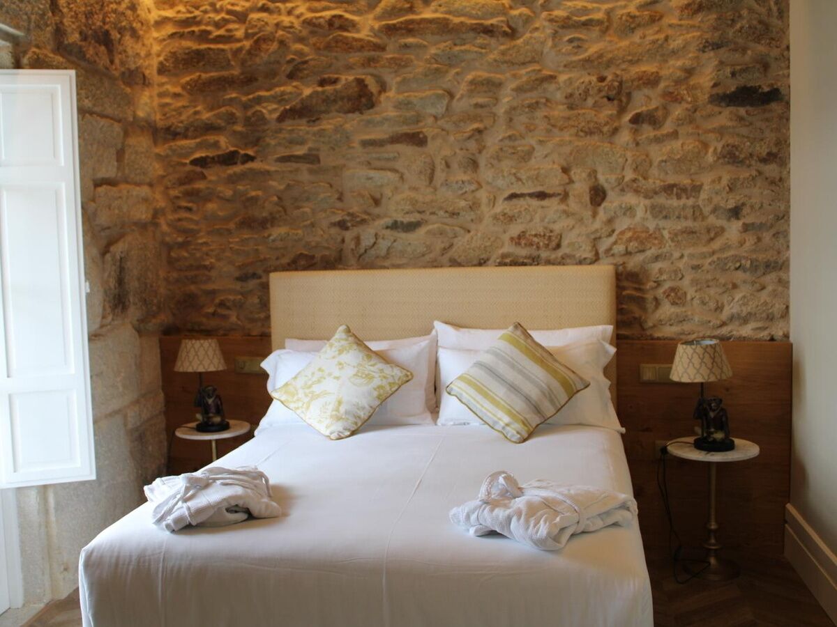 Ropa de cama de alta calidad y minibar con artículos gratuitos 