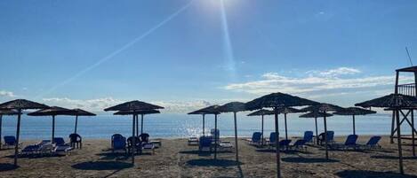 Beach nearby, sun-loungers, beach towels