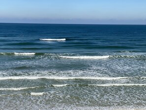 On the beach, sun-loungers, beach towels