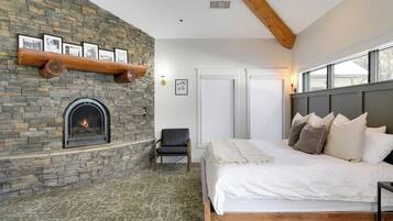 Habitació individual prèmium, vistes al llac | Matalassos amb encoixinament addicional i planxa i posts de planxar