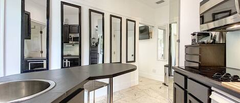 Fridge, microwave, stovetop, coffee/tea maker