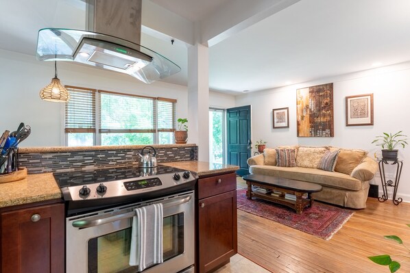 Fridge, microwave, coffee/tea maker, cookware/dishes/utensils