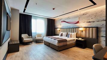 Suite, 1 King Bed | Premium bedding, minibar, in-room safe, desk