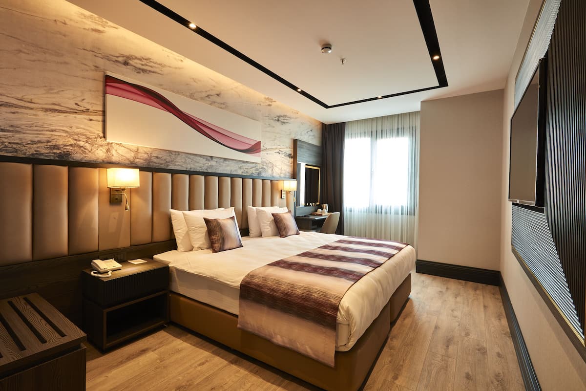 Biancheria da letto di alta qualità, minibar, una cassaforte in camera