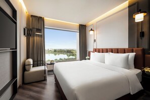 Deluxe Room, 1 King Bed | Individually furnished, desk, laptop workspace, bed sheets