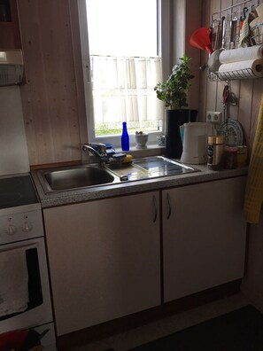Fridge, oven, coffee/tea maker, toaster