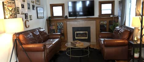 Smart TV, fireplace, foosball, books