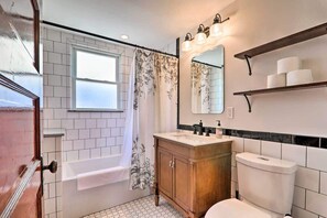 Baignoire, sèche-cheveux