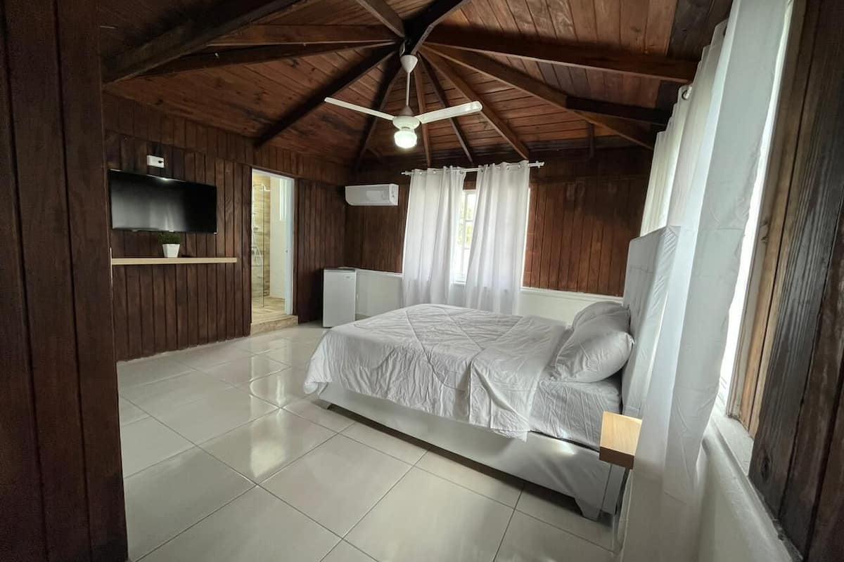 signature room | premium bedding, down duvets, pillow-top beds, blackout curtains