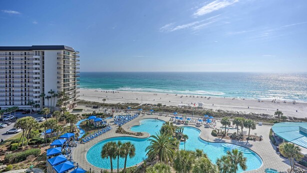A resort with a pool, beach, and ocean view. - PCB Vacation Rental w/ Sweeping Ocean Views! (Panama City Beach)