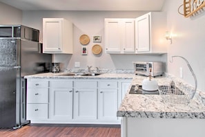 Fridge, microwave, stovetop, coffee/tea maker