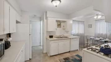 Fridge, microwave, oven, cookware/dishes/utensils