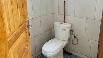 Shower, towels, soap, toilet paper
