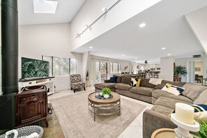 Smart TV, fireplace, foosball, books