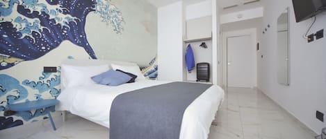 Suite "L'Onda" | Free minibar, individually furnished, desk, laptop workspace