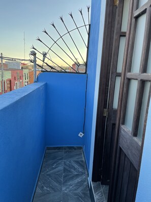 Comfort Room, Multiple Beds, Smoking, City View | Terrace/patio