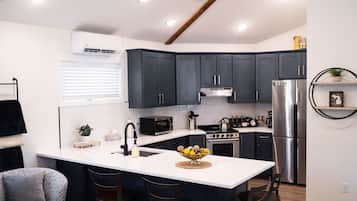 Coffee/tea maker, fridge, microwave, oven