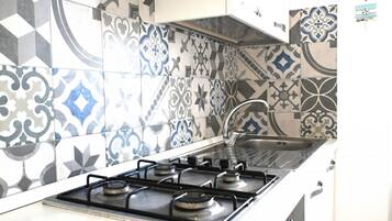 Fridge, oven, dining tables