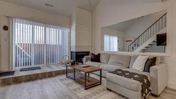 Flat-screen TV, fireplace