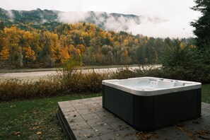 Outdoor spa tub - Riverside Retreat - Skagit River with hot tub, fire pit, views (Concrete)