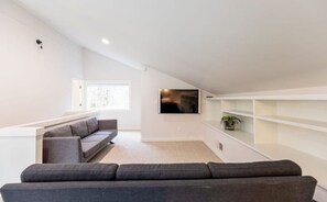 Smart TV, fireplace, table tennis, books