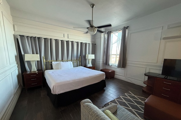 Premium bedding, desk, laptop workspace, free WiFi