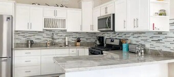 Spacious 3 BR  family home in quiet gated community. Central to attractions.