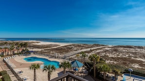 A resort with a swimming pool, beach access, and a view of the ocean. - Phoenix East by Brett Robinson Vacations (Orange Beach)