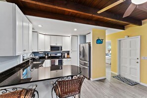 Fridge, microwave, oven, stovetop - Singer Island pool home (West Palm Beach)