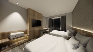 Chambre Premier avec lits jumeaux | Coffre-fort, bureau, espace de travail pour ordinateurs portables