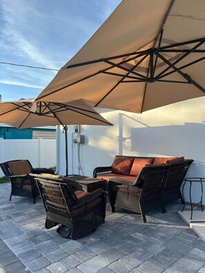 Terrace/patio - A cozy two bedroom beach house. (Naples)