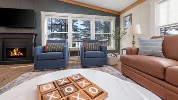 Smart TV, fireplace, books