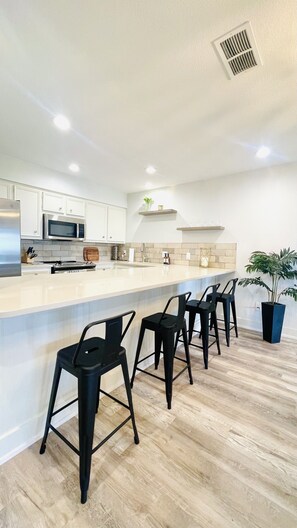 Fridge, microwave, oven, stovetop - Caballo Bay at Horseshoe Bay | Sylish Retreat with Stunning Lake LBJ Views, Pool (Horseshoe Bay)