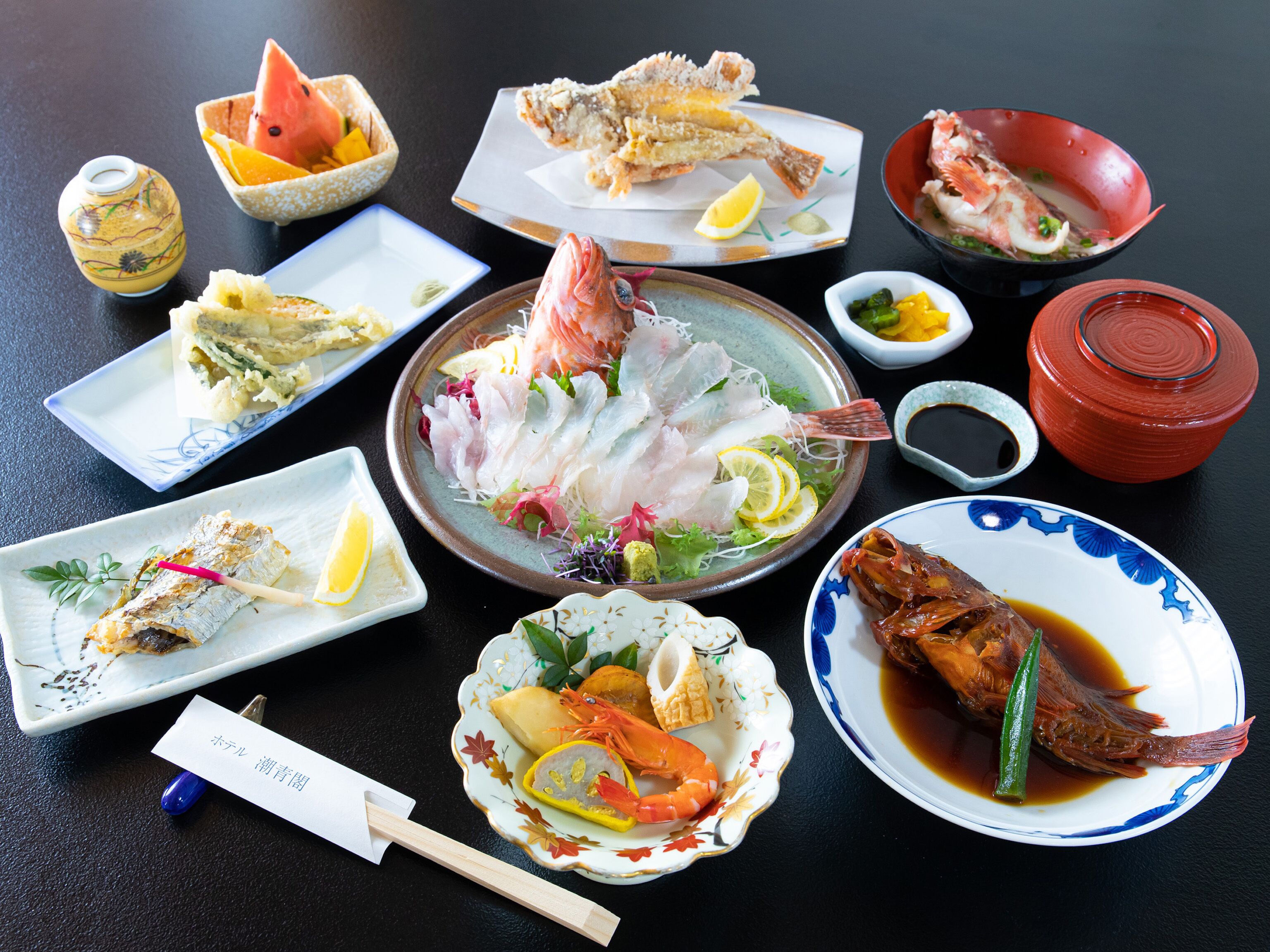 A variety of seafood dishes on a table.