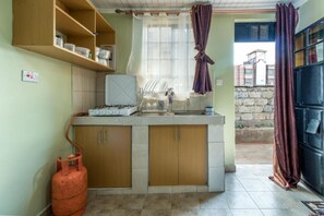 Classic Apartment | Private kitchenette | Cookware/dishes/utensils - AnD Suites Nairobi (Kikuyu)