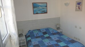 1 bedroom, iron/ironing board, travel crib