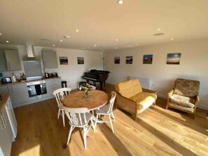 Living area - Wonderful rural idyll with glorious views and Yamaha baby grand piano (Ledbury)