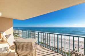 A balcony with a view of the ocean and beach. - Surfside Shores 1501 (Gulf Shores)