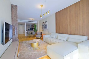 Departamento Deluxe, 1 habitación | Ropa de cama de alta calidad y caja de seguridad en la habitación 