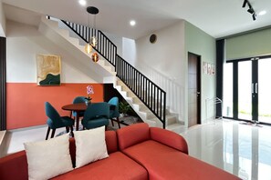 Family Villa | Living area | 32-inch LCD TV with digital channels, TV - TwoSpaces Living at Panorama Villas Batu (Batu)