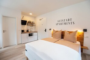 Departamento superior, cocina, vista a la ciudad | Espacio para trabajar con laptop y wifi gratis 