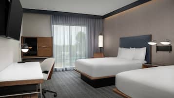 Premium bedding, memory foam beds, blackout drapes, iron/ironing board