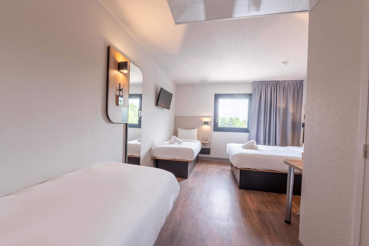 Room (Quadruple) | 1 bedroom, desk, laptop workspace, blackout drapes