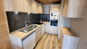 Refrigerador, microondas, horno y lavavajillas 