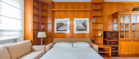 1 غرفة نوم ومكواة/لوح كي وخدمة الإنترنت وملاءات أسرّة