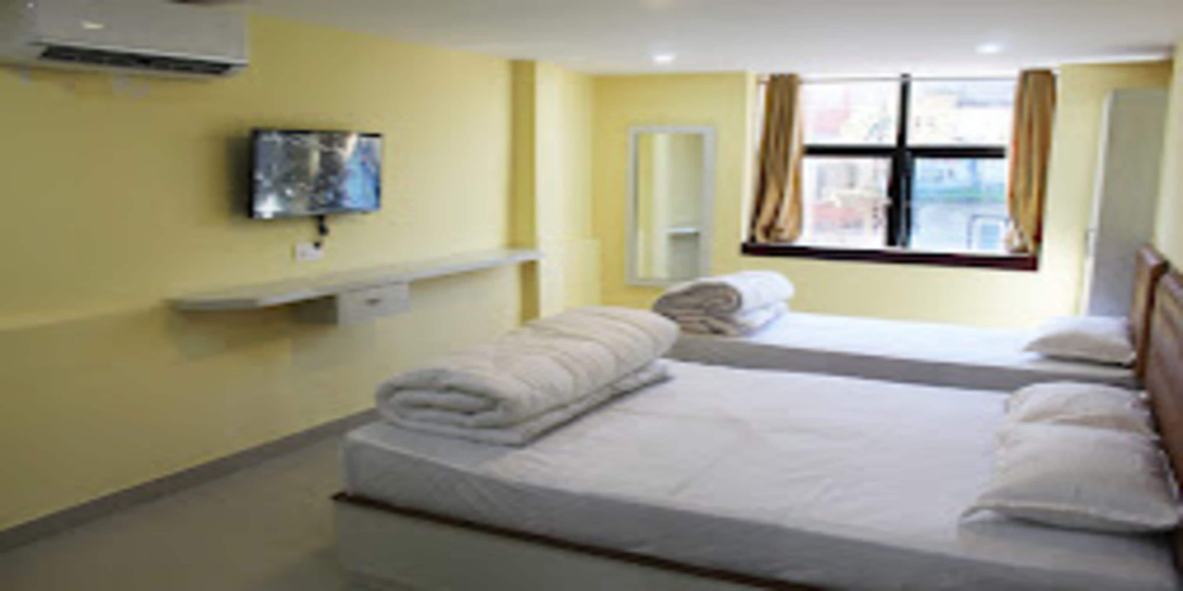 Neljän hengen perhehuone | Ilmainen Wi-Fi, vuodevaatteet