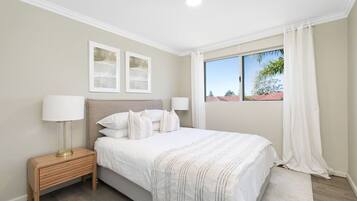 4 bedrooms, desk, iron/ironing board, travel cot
