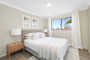 4 bedrooms, desk, iron/ironing board, travel cot