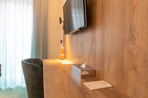 Premium bedding, desk, laptop workspace, free WiFi